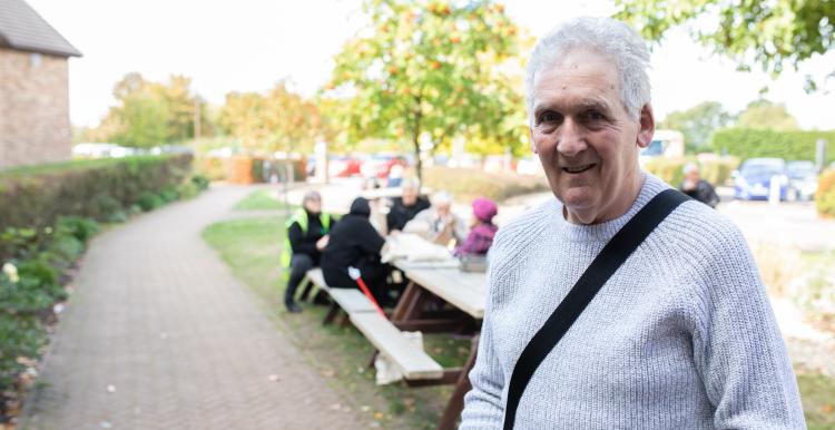 Older man in a park.