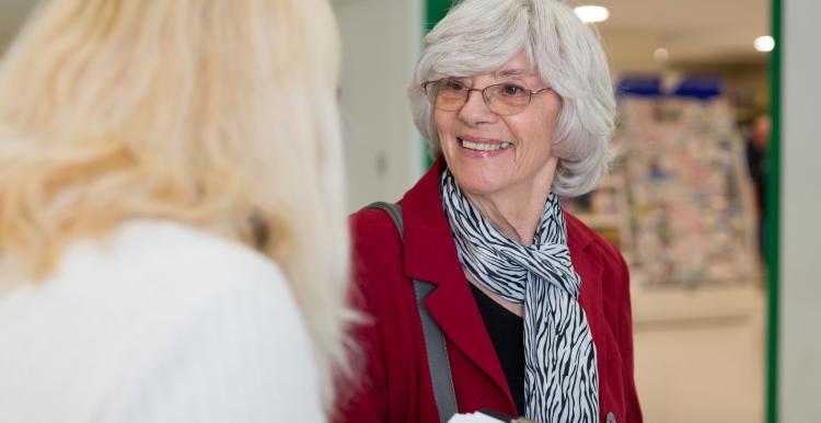 Woman sharing her views with Healthwatch staff member