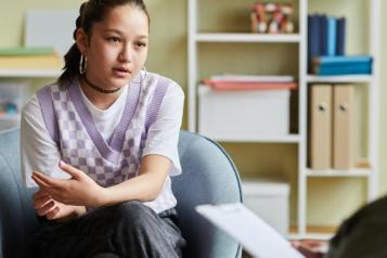 Woman talking to therapist.