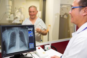 Doctor looking at imaging of a patient