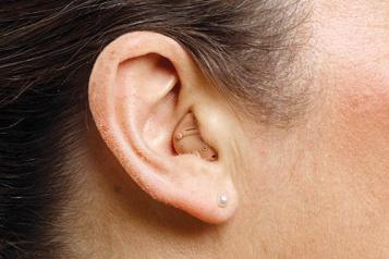 womens-ear-with-hearing-aid