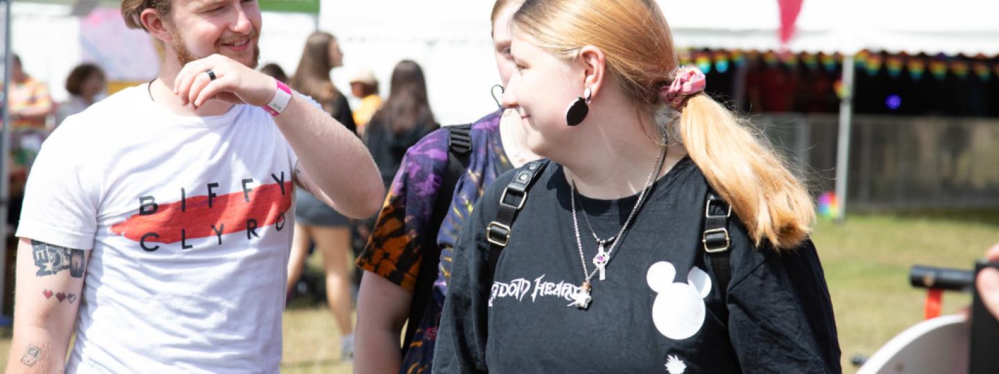 Young people walking together at a festival